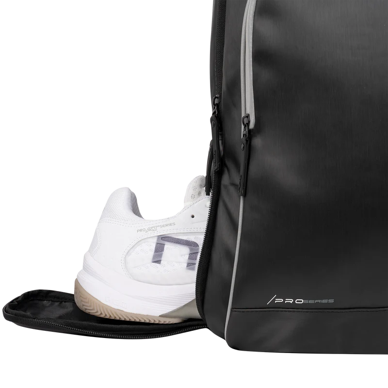 Black NOX Padel Backpack Pro Series 28L with multiple compartments and padded straps for comfortable carrying.