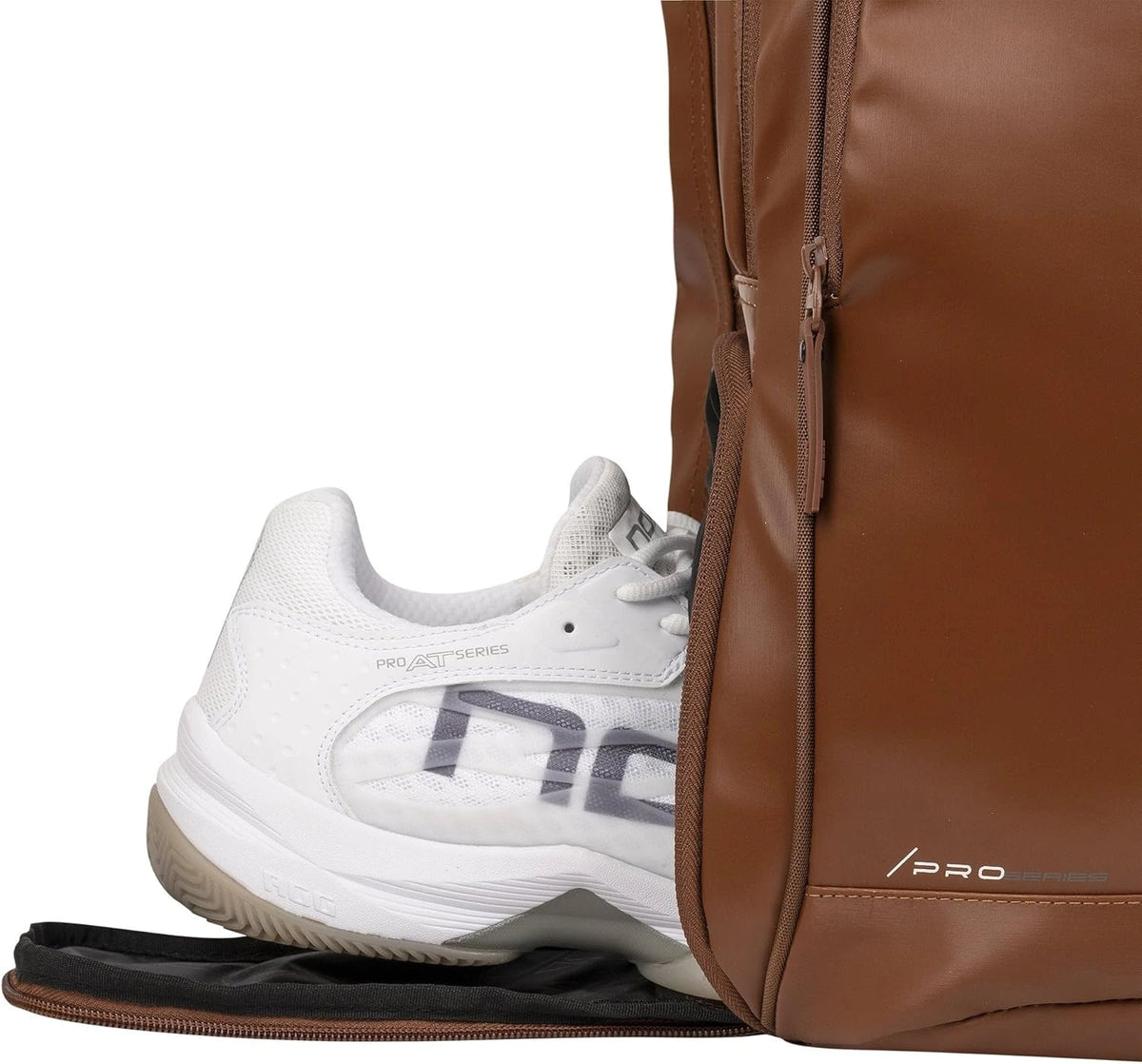 Camel brown NOX Padel Backpack Pro Series 28L with multiple compartments and padded straps for comfortable carrying.