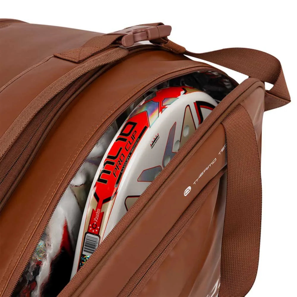 Large brown camel NOX Pro Series racket bag with multiple compartments, designed for tennis and sports gear storage.