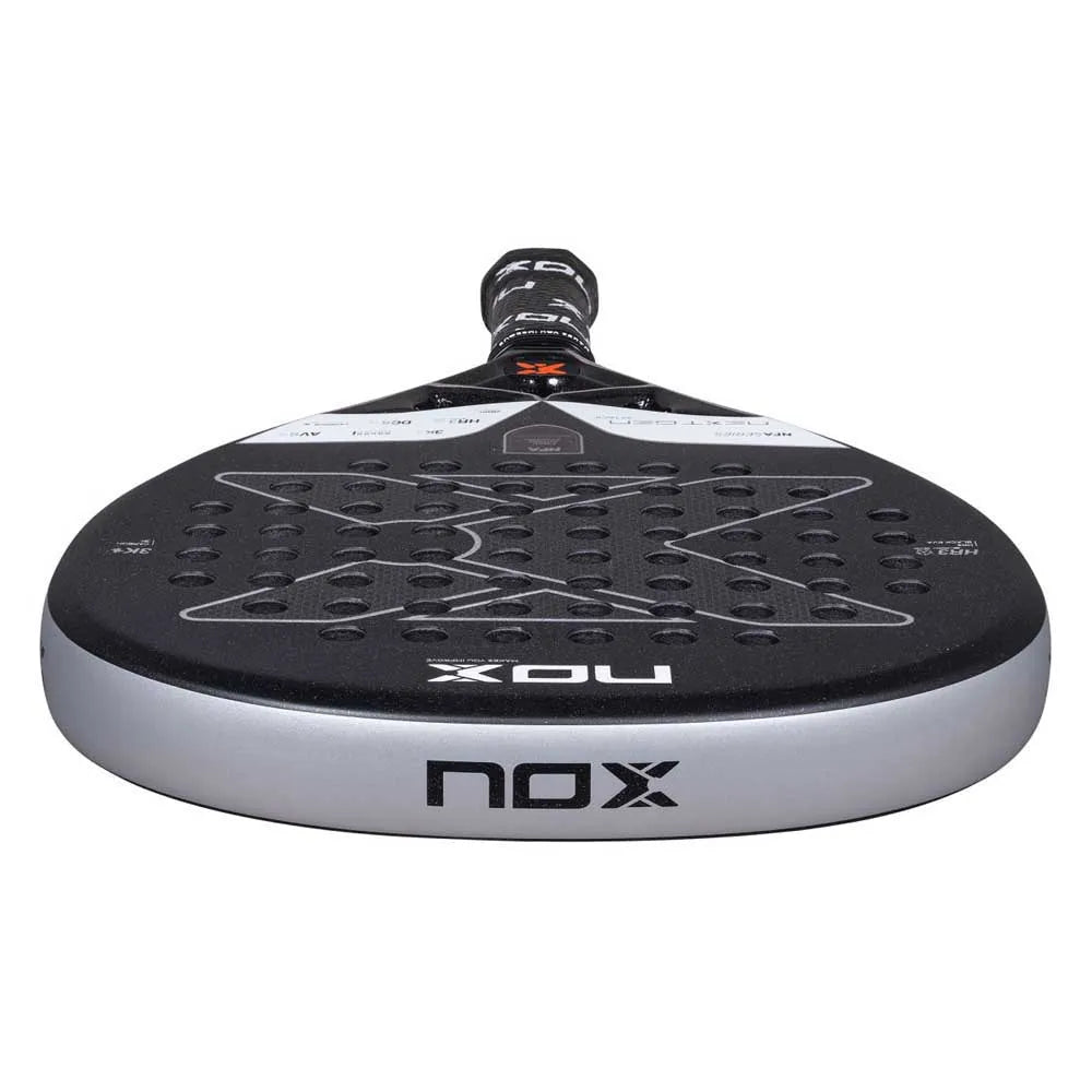 Nox NextGen Pro Attack 3K padel racket with black and red design, lightweight frame, and textured hitting surface.