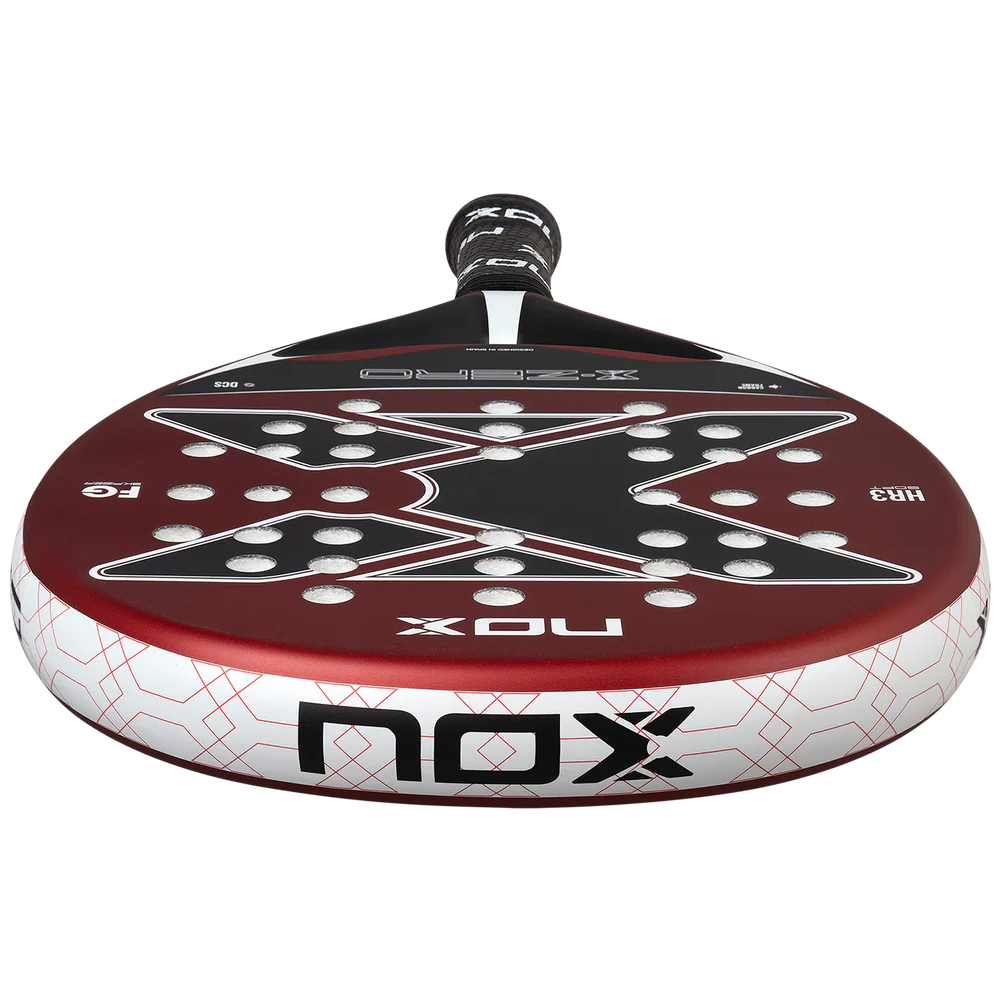 Nox X-Zero Red 2026 padel racket with red and black design, featuring a lightweight frame and perforated hitting surface.