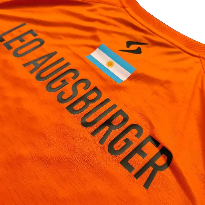 Orange Siux Leo Augsburger Club 26 T-shirt in size XL, displayed flat with front view showing the colorful design.