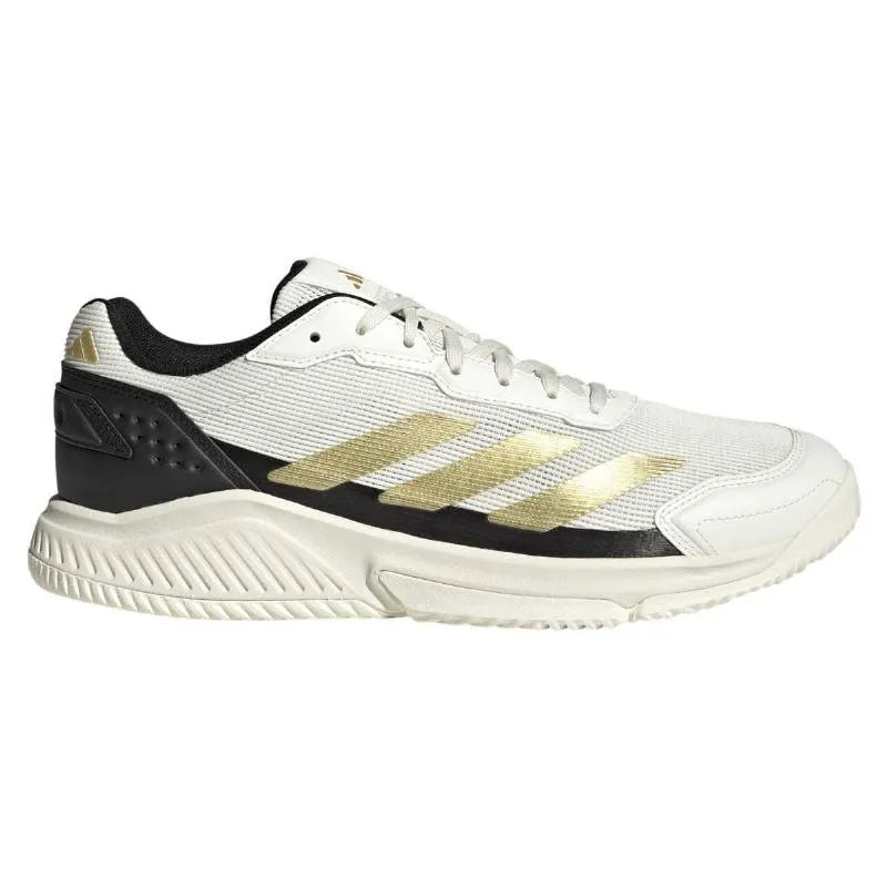 Adidas Courtquick Padel trainers in white, gold, and black with UK 9.5 size, featuring sporty design and breathable material.