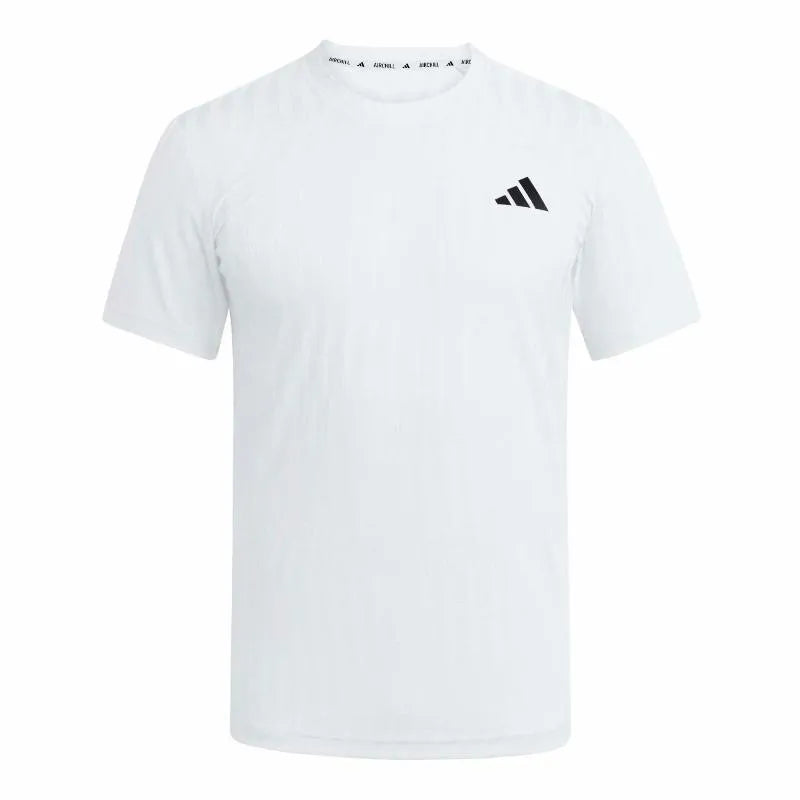 White Adidas Tennis Freelift T-Shirt displayed flat with front view, showcasing lightweight fabric and athletic fit.