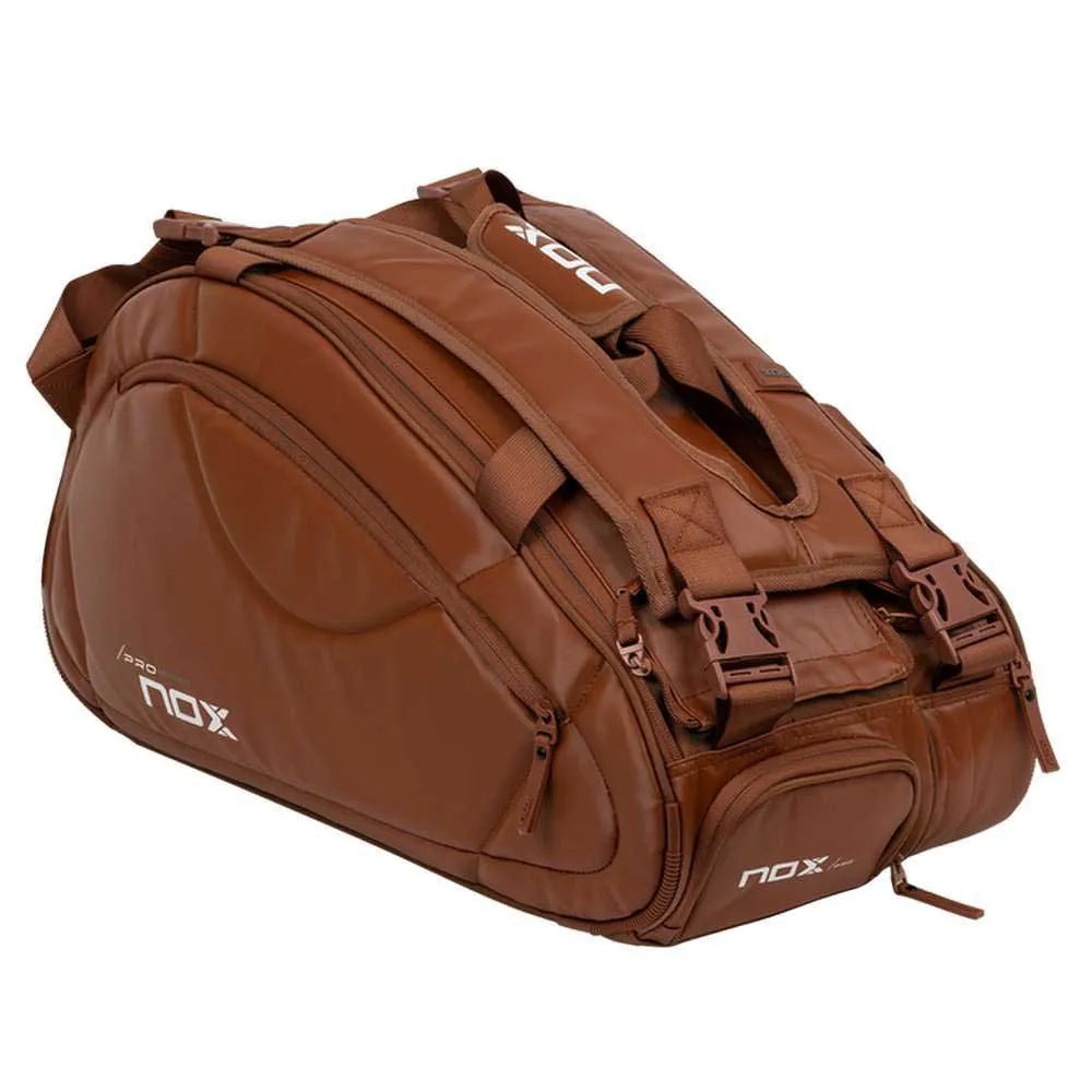 Large NOX Pro Series racket bag in brown camel color with multiple compartments and adjustable straps, designed for tennis gear.