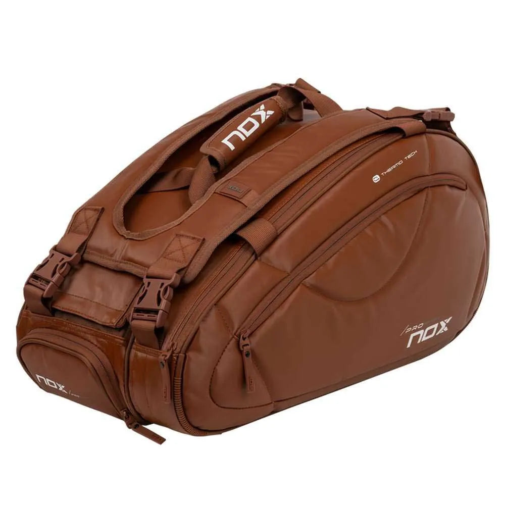 Large NOX Pro Series racket bag in brown camel color with multiple compartments, designed for tennis or sports gear storage.