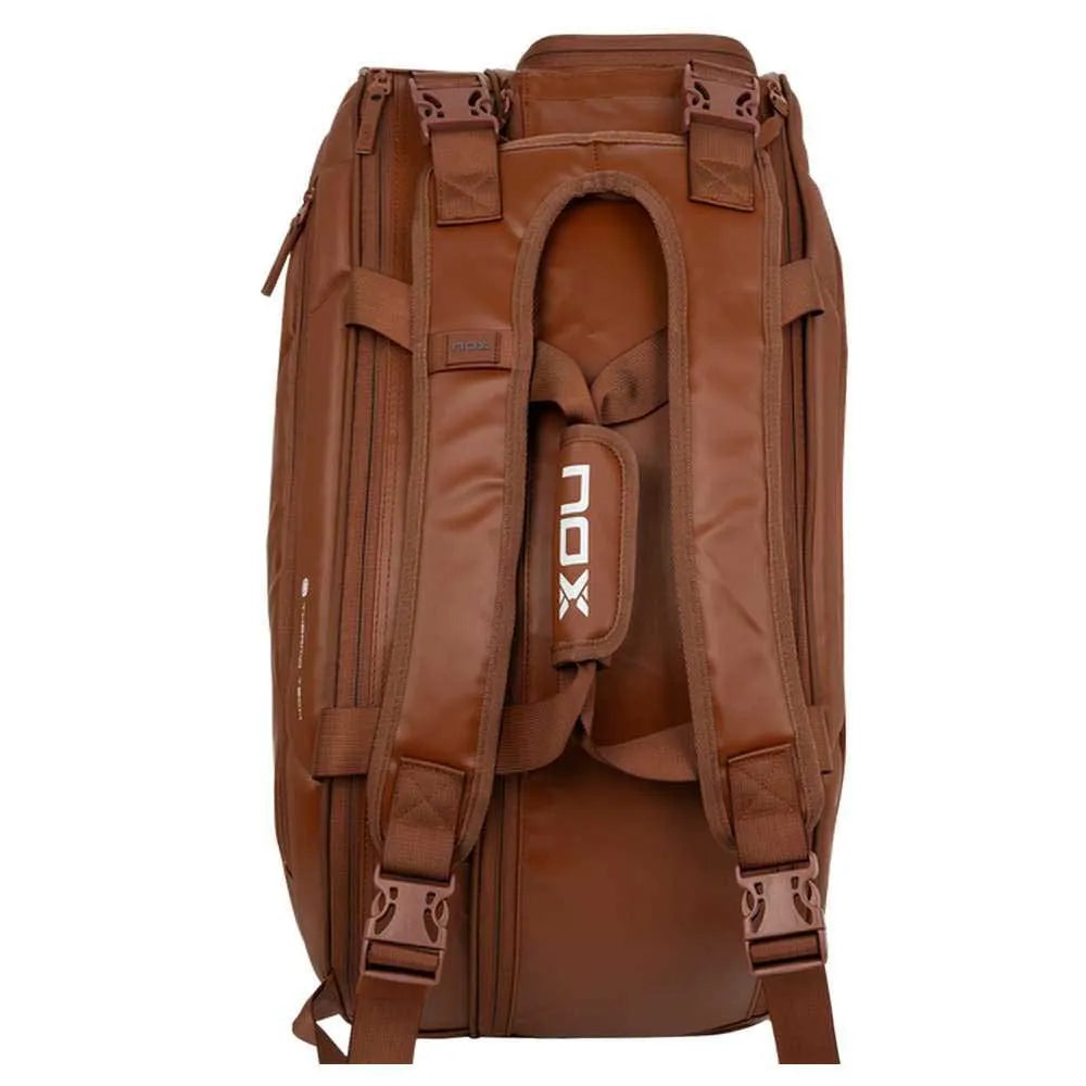 Large NOX Pro Series racket bag in brown camel color, featuring multiple compartments and padded straps for easy carrying.
