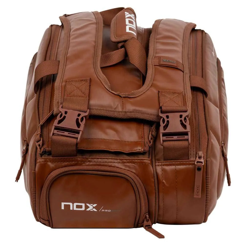 Large NOX Pro Series racket bag in brown camel with multiple compartments, designed for tennis or padel gear.