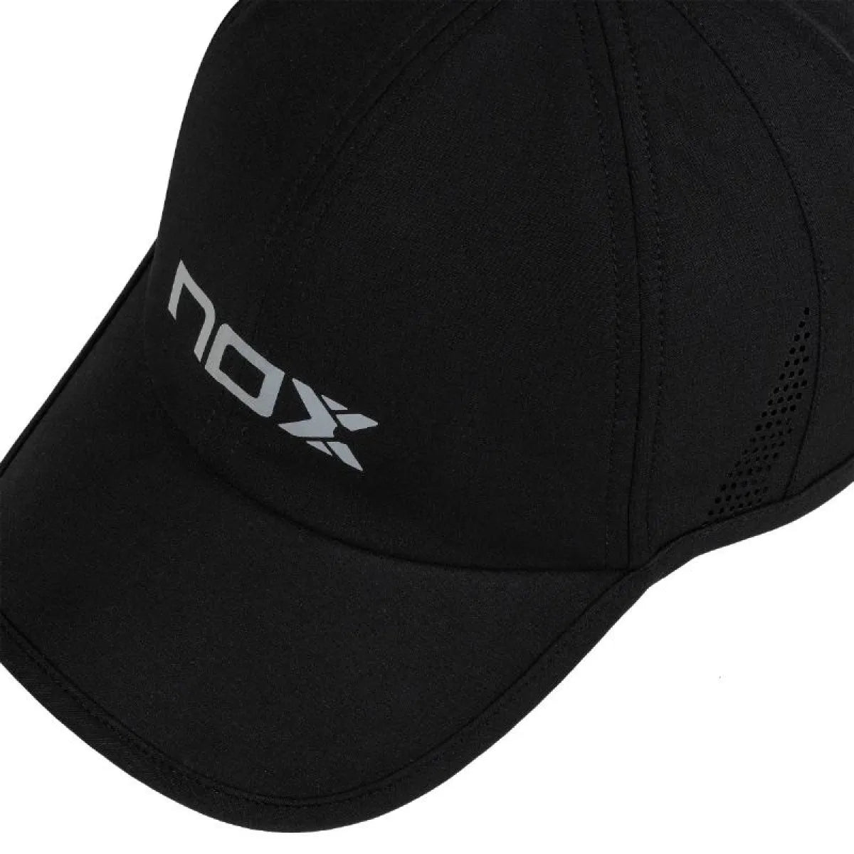 Nox black and white cap with adjustable strap, featuring the brand logo on front and curved brim, casual outdoor headwear.
