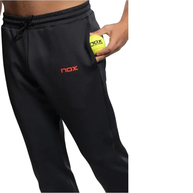 Black Nox Team pants in large size with a relaxed fit, featuring a comfortable waistband and casual style.