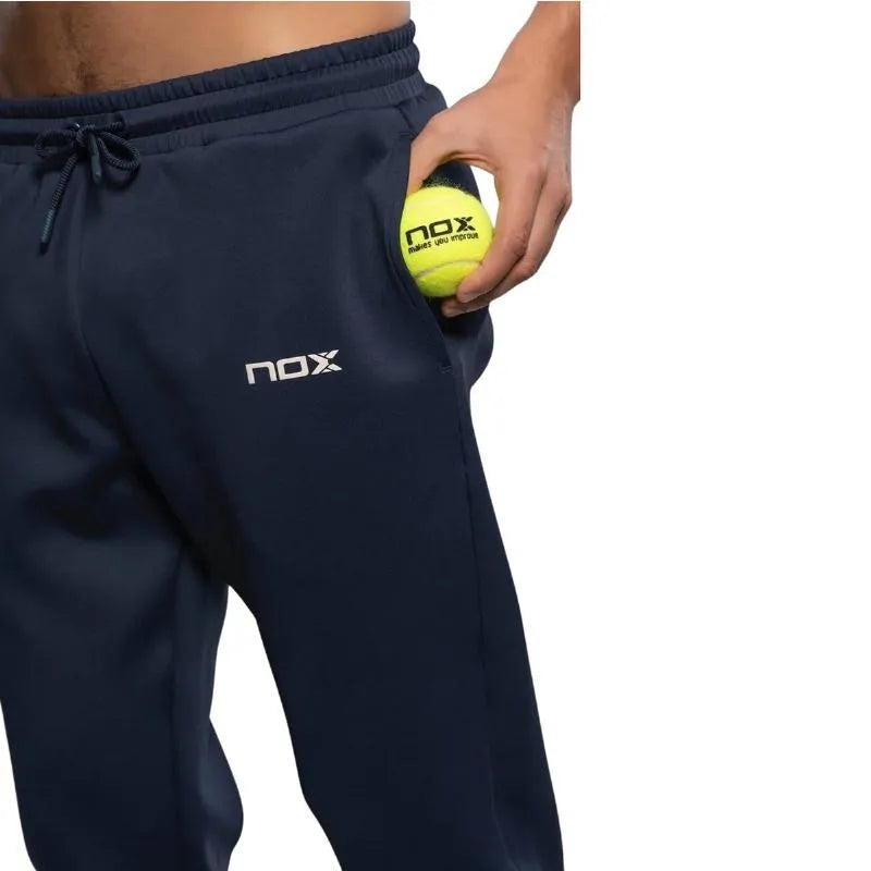 Nox Team navy blue pants in large size, showing the front view with a relaxed fit and detailed waistband.