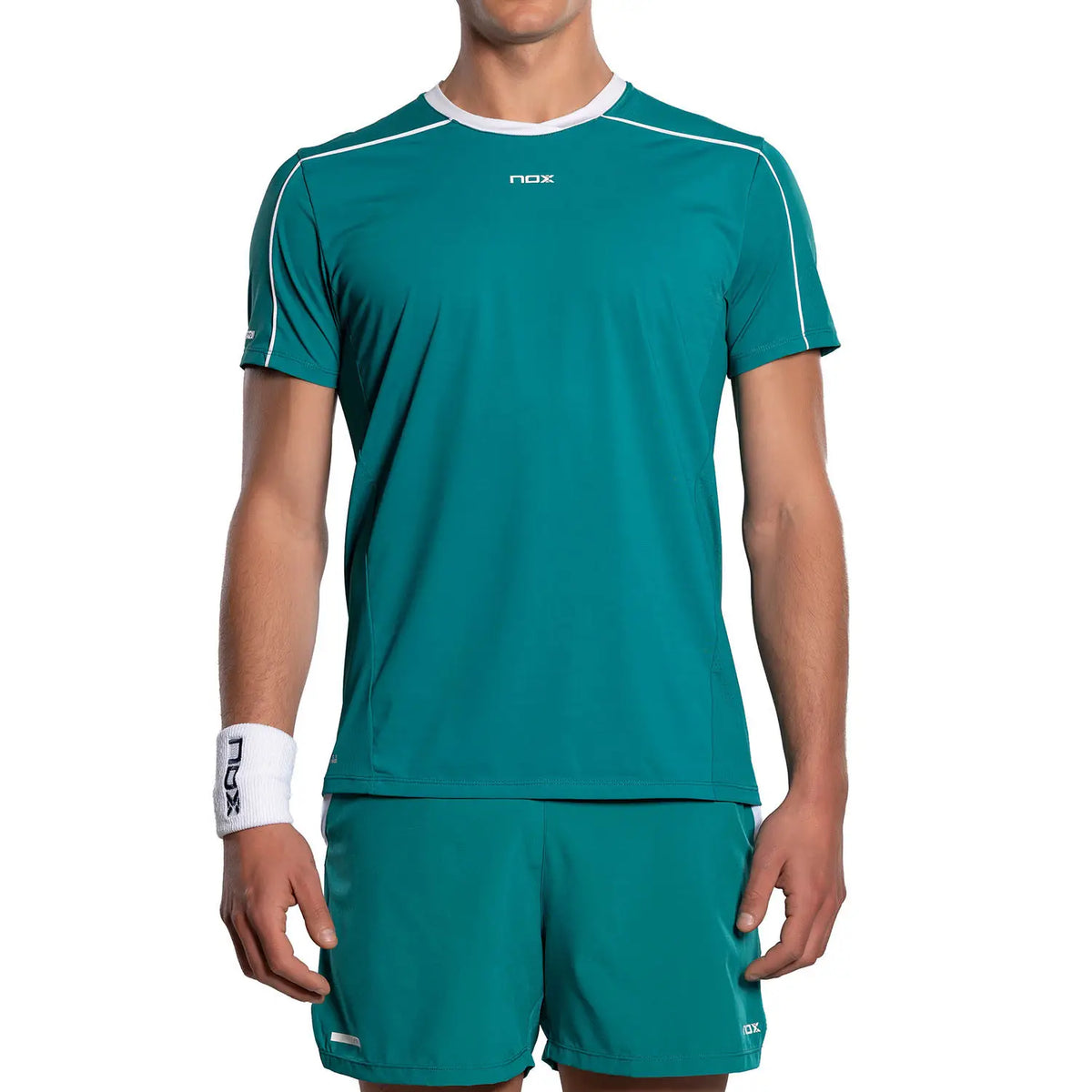 Ivy green Nox Pro T-shirt by PDLSport displayed flat with front view, showing the fitted short-sleeve design and logo details.