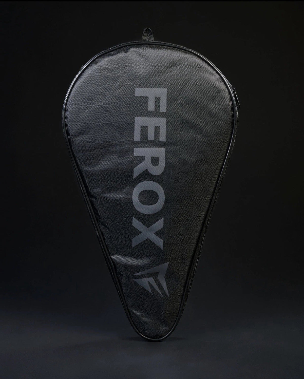 Ferox All Court 3K Padel Racket with black and red design, featuring a lightweight frame and textured surface for optimal play.